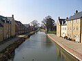 Cleared part of the Stroudwater canal with new housing development alongside