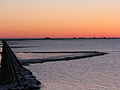 Evening view of the islet with its four wharfs and the Lorendamm, seen from the mainland