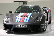 The Porsche 918 Spyder is powered by a 4.6 liter V8 engine with 447 kW, which is based on the 3.4 liter engine of the Porsche RS Spyder. E-motors on the front- and back-axle are adding 210 kW to a total engine performance of 652 kW.