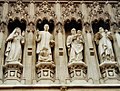 Four of the ten Christian martyrs depicted in statues above the Great West Door