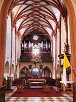 The interior has a Gothic rib vault.