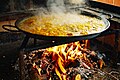 A paella cooked in the street