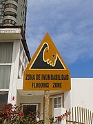 A Tsunami hazard sign (Spanish – English) in Iquique, Chile