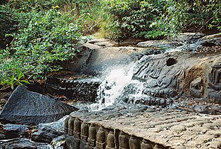 River bed sculpted with lingas and divine images