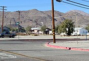 A Mountain Monogram "T" sits on the hills above Trona.