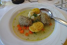 Hochzeitsuppe with liver dumplings, egg stitch, cauliflower and carrots as inlays