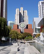 The building as seen from Yerba Buena Gardens, rising behind the San Francisco Museum of Modern Art