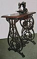 A Wilcox and Gibbs Sewing Machine with ornate treadle from around 1925.