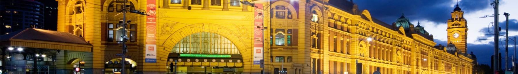 Flinders Street Station in the City Centre by dusk