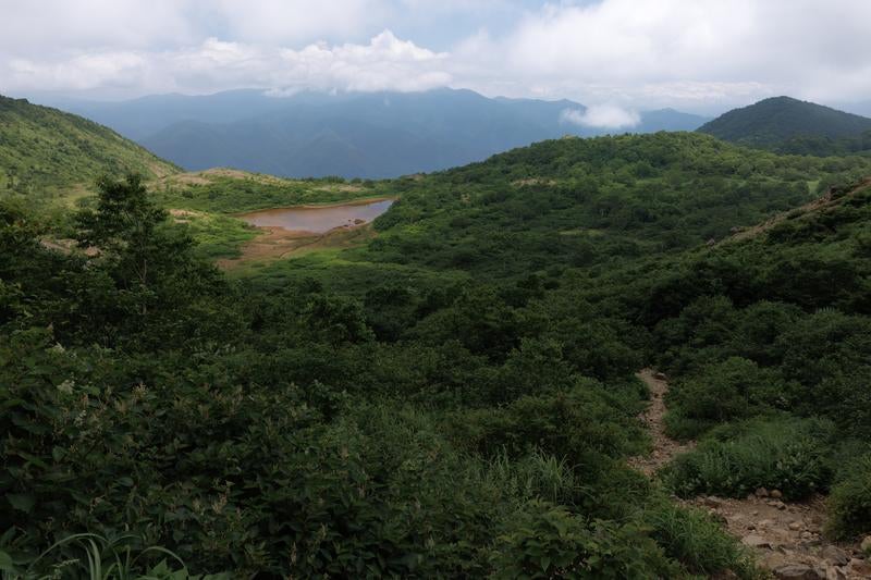 磐梯山猪苗代登山口の神秘的なトレイルの写真