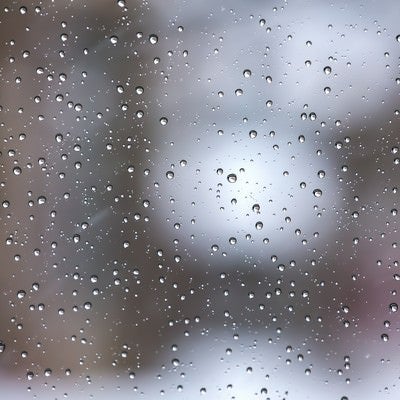 窓の水滴と雨（テクスチャー）の写真