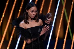 LONDON, ENGLAND - FEBRUARY 16: Zoe Saldaña accepts the Supporting Actress Award for 'Emilia Pérez' on stage during the EE BAFTA Film Awards 2025 at The Royal Festival Hall on February 16, 2025 in London, England. (Photo by Stuart Wilson/BAFTA/Getty Images for BAFTA)