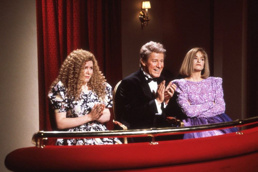 SATURDAY NIGHT LIVE, from left: Julia Sweeney (as Chelsea Clinton), Phil Hartman (as President Bill Clinton), Jan Hooks (as First Lady HIllary Clinton), 'Inaugural Gala', (Season 18, ep. 1811, aired Jan. 16, 1993), 1975-. photo: Al Levine / ©NBC/courtesy Everett Collection