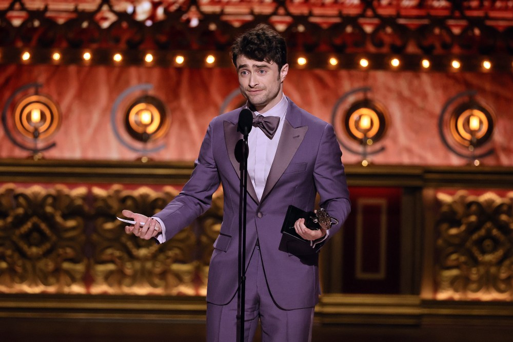 NEW YORK, NEW YORK - JUNE 16: Daniel Radcliffe accepts the Best Performance by an Actor in a Featured Role in a Musical award for "Merrily We Roll Along" onstage during The 77th Annual Tony Awards at David H. Koch Theater at Lincoln Center on June 16, 2024 in New York City.  (Photo by Theo Wargo/Getty Images for Tony Awards Productions)