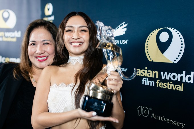 LOS ANGELES, CALIFORNIA - NOVEMBER 21: The Rising Star Award went to Filipino actress Kathryn Bernardo (“The Hows of Us,” “Hello, Love, Goodbye”) presented by veteran Vietnamese American actress Kieu Chinh (“The Joy Luck Club,” “Hamburger Hill”) at the Asian World Film Festival closing night at the Culver Theater on November 21, 2024 in Culver City, California.  (Photo by Greg Doherty/Getty Images for Asian World Film Festival)