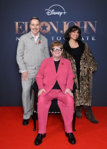 LONDON, ENGLAND - NOVEMBER 08: (L-R) David Furnish, Elton John and Raye attend the "Elton John: Never Too Late" special screening at The Ham Yard Hotel on November 08, 2024 in London, England. (Photo by Antony Jones/Getty Images for Disney+)