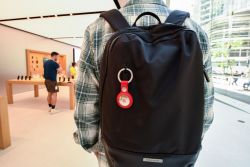 SYDNEY, AUSTRALIA - APRIL 30: A key ring containing an AirTag attached to a rucksack inside the Apple Store George Street on April 30, 2021 in Sydney, Australia. Apple's latest accessory, the AirTag is a small device that helps people keep track of belongings, using Apple's Find My network to locate lost items like keys, wallet, or a bag. (Photo by James D. Morgan/Getty Images)