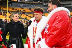 PITTSBURGH, PENNSYLVANIA - DECEMBER 25: Patrick Mahomes #15 and Travis Kelce #87 of the Kansas City Chiefs speaks with a NETFLIX reporter after the game against the Pittsburgh Steelers at Acrisure Stadium on December 25, 2024 in Pittsburgh, Pennsylvania. (Photo by Joe Sargent/Getty Images)