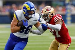 INGLEWOOD, CALIFORNIA - SEPTEMBER 22: Colby Parkinson #86 of the Los Angeles Rams runs against Ji'Ayir Brown #27 of the San Francisco 49ers during the second half at SoFi Stadium on September 22, 2024 in Inglewood, California. (Photo by Kevork Djansezian/Getty Images)