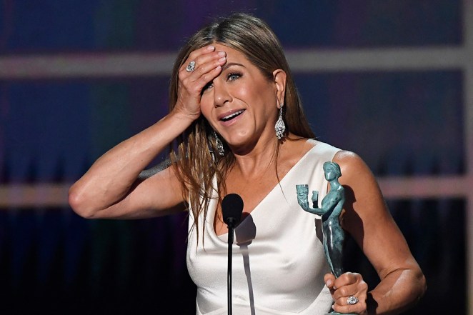 "The Morning Show" actress Jennifer Aniston accepts her SAG Award .