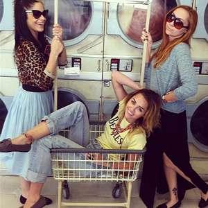 Miley Cyrus poses with sister Brandi Cyrus and pal Denika Bedrossian.