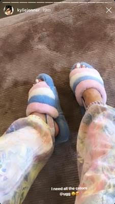 Kylie Jenner wearing the Ugg "Pride Fluff Yeah Slide."