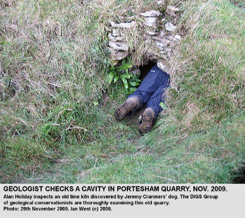 Geologist Alan Holiday inspects and old lime kiln at Portesham Rocket Quarry, Dorset, 29th November 2009