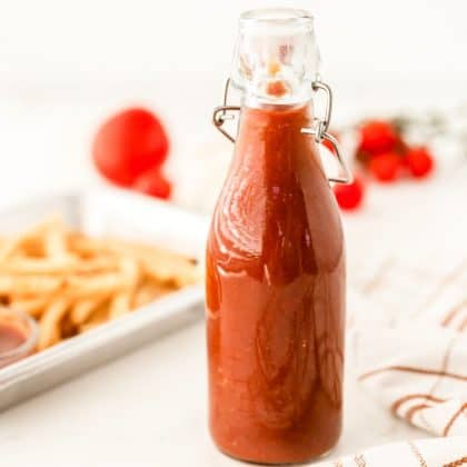 homemade ketchup in a glass bottle