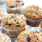 applesauce bran muffins resting in a cooling rack