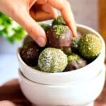 healthy matcha truffles in a white bowl.