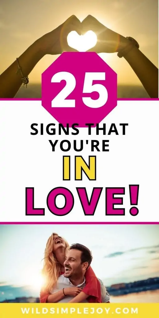 25 Signs you're in LOVE! (Pinterest Image with hands making a heart and a couple laughing.)