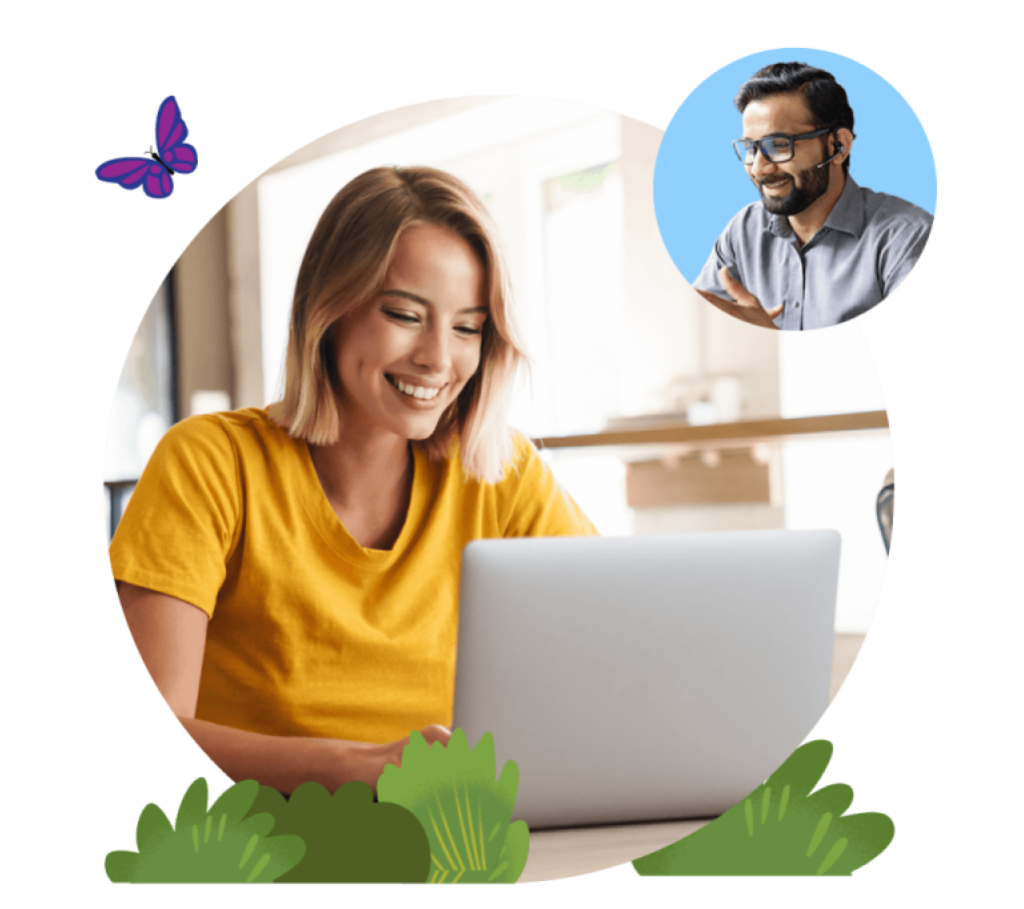 A smiling woman sitting in front of a computer chats with a support representative.