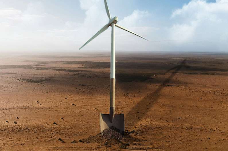 A wind turbine morphing into a shovel digging into the ground