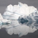 A close up of a snow covered mountain.