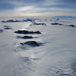 A close up of a snow covered slope