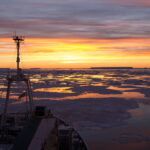 A sunset over a body of water