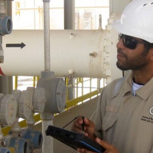 Man observing gas valve