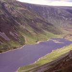 A loch surrounded by high rocky ridges