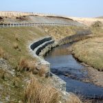 River bank reinforcement. © Copyright Roger Whittleston and licensed for reuse under this Creative Commons Licence.