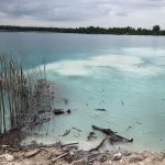 Sand mining settlement pond Malaysia. BGS © UKRI.