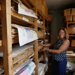 Rebecca Mumpansha, a GSD librarian, with the sales stock of geological maps. © Rachel Talbot. 