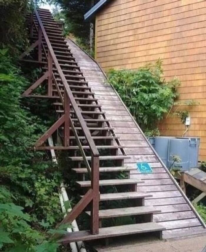 Design disaster with a steep staircase beside an uneven wheelchair ramp, showcasing impractical architecture.