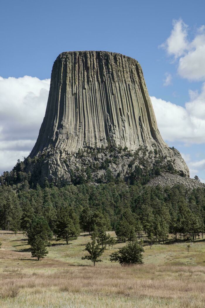 “Devil's Tower, Wyoming. A Large Butte, It Reaches 5112 Feet About Sea Level.”