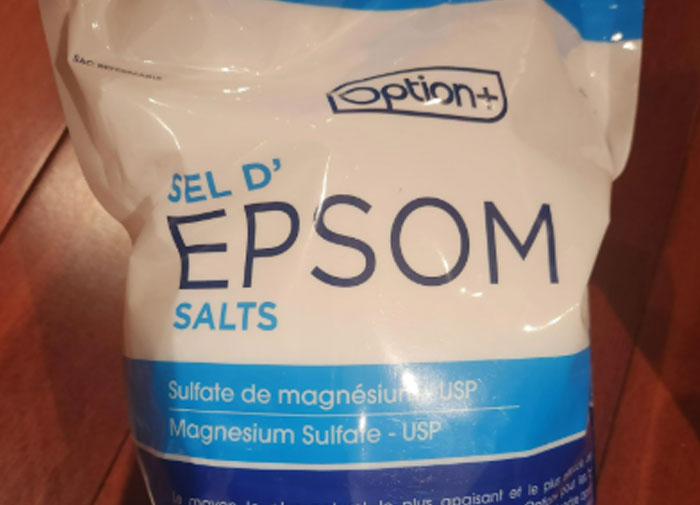 Bag of Epsom salts on a wooden surface, related to using things the wrong way.