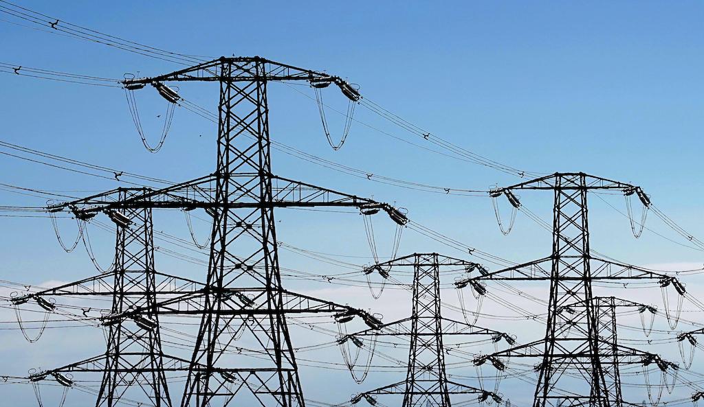 Electricity pylons from Dungeness nuclear power station in Kent.