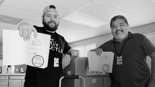 Young Life staff Eric Collins (left) and Felix Chavez (right) gave personal Bibles to teenage boys seeking refuge in the US.