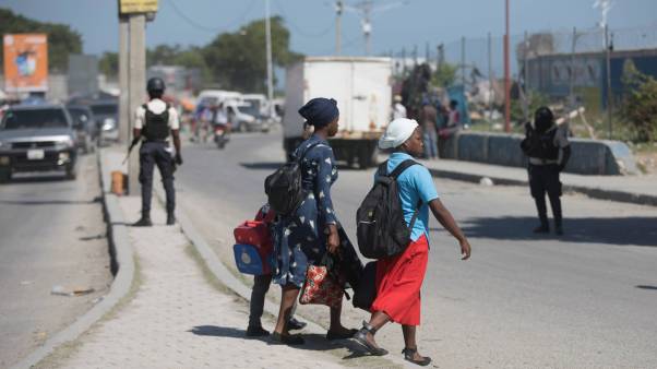 Police patrol the streets in Port-au-Prince, Haiti.