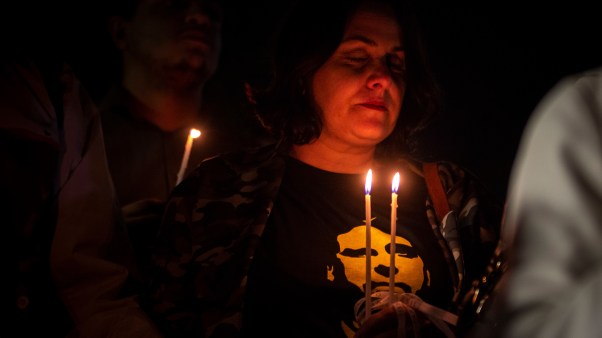 Supporters of Jair Bolsonaro hold a prayer vigil in support of the candidate after he was stabbed.