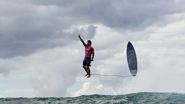 Brazil's Gabriel Medina reacts after getting a large wave in men's surfing during the Paris 2024 Olympic Games.