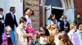 People in the 1970s walking out of a church